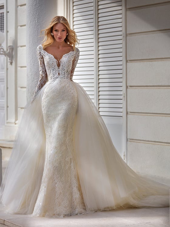 Sensational lace and glitter mermaid dress with V-neck front and back and guipure lace around the entire outer edge. 
